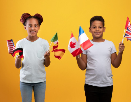 happy black kids posing with various flags resized