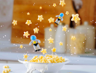 two astronauts levitate over plate of cornflakes 2024 01 19 23 14 43 utc